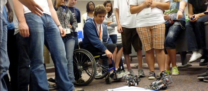 A student in a wheelchair integrated in a group of STEM students